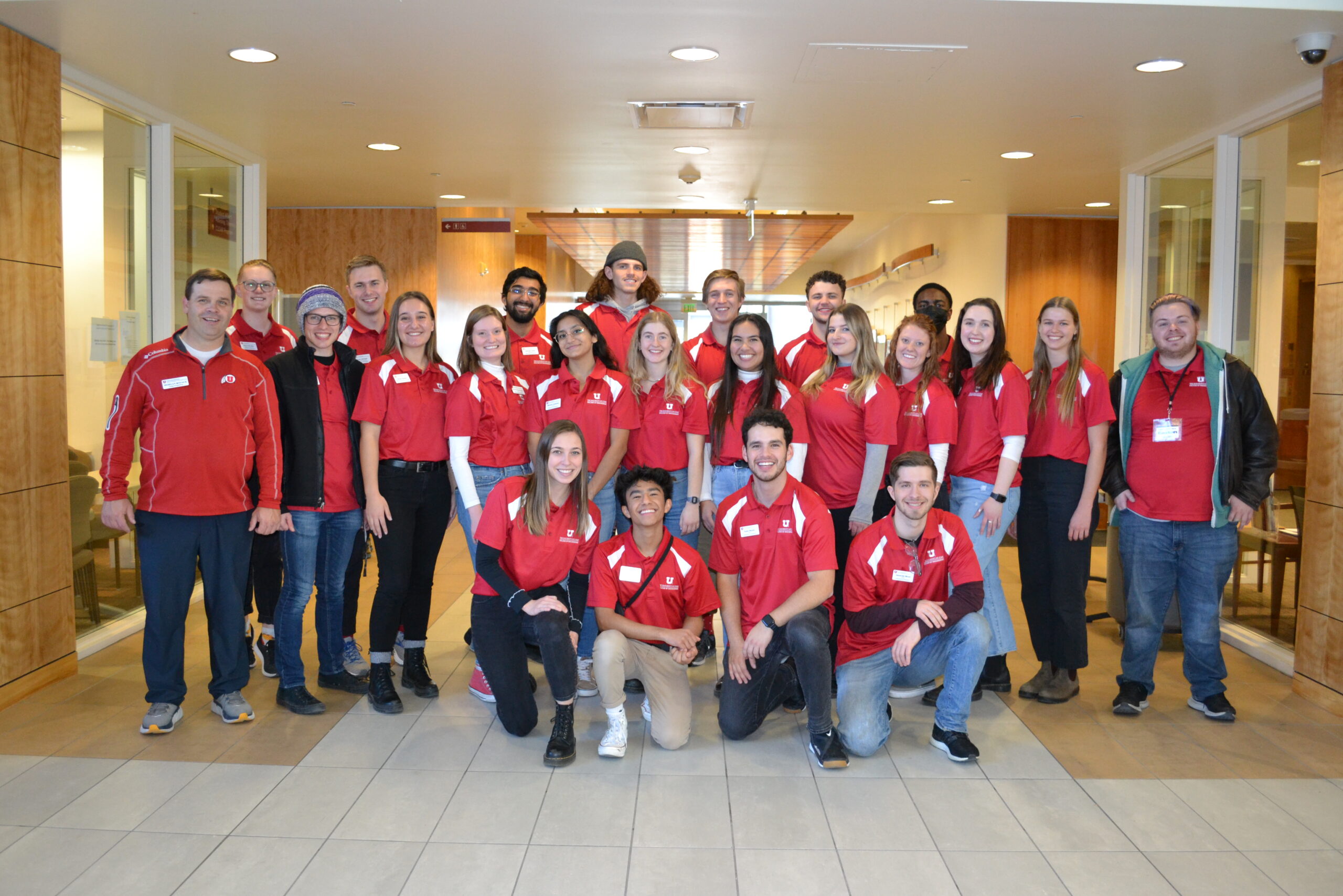 Photo of group of 17 engineering day ambassadors all wearing red shirts