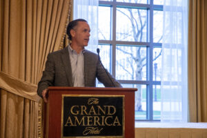 Michael Stubblefield stands at a lectern