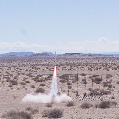 A model rocket taking off