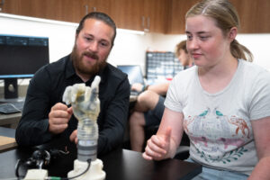 Jacob George and a young patient