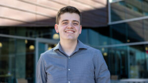 Dean Smith poses outside