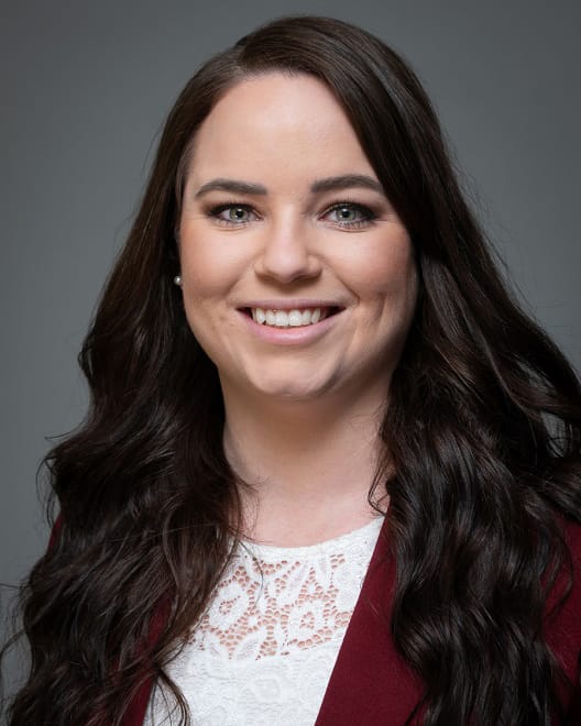 Headshot of professor Ashley Dalrymple