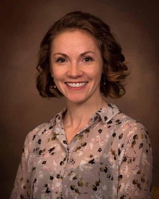 Headshot of professor Ashley Spear